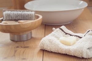 Clean washcloth and warm water - perfect remedy for acne scabs.
